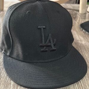 Genuine Merchandise Black Cap with Logo